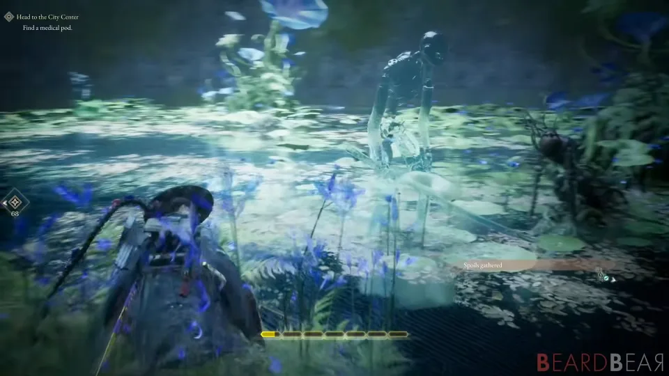 A flooded overgrown expanse of pale blue flowers and lily pads, a thin figure standing in the shallows ahead. The on-screen objective reads “Head to the City Center”.