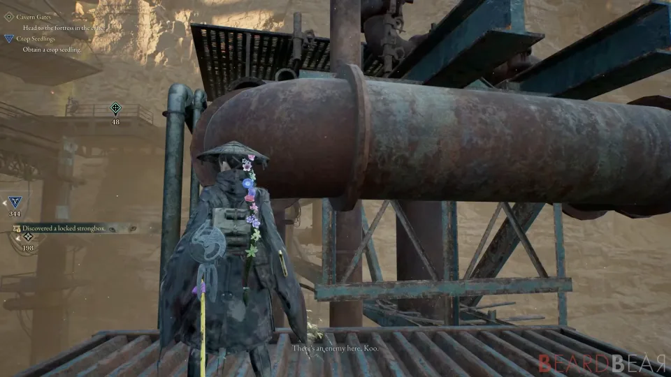 The player character on a metal walkway beside a large rusted cylindrical tank under a pale sky.